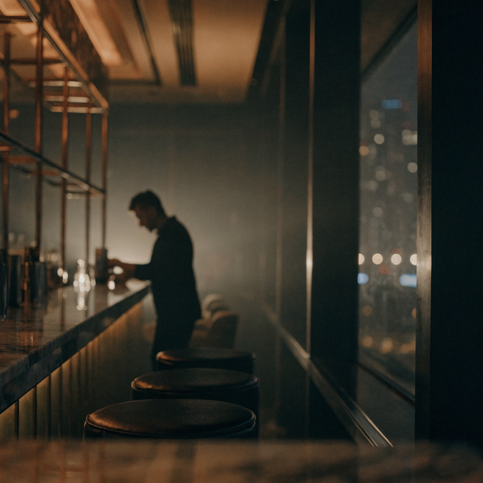 Upscale dark Dubai cocktail bar at night | Addtocart Dubai UAE