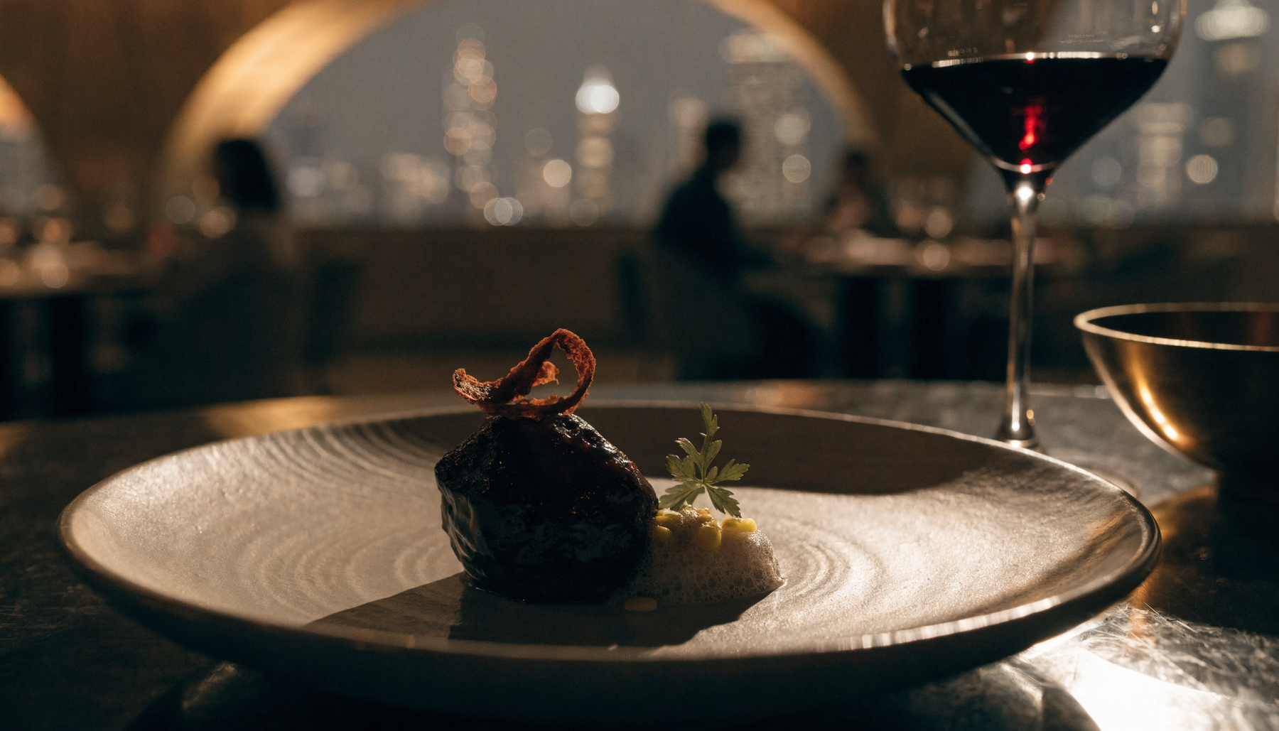 Elegant plated fine-dining dish with a Dubai skyline behind | Addtocart Dubai UAE