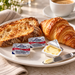 Lurpak unsalted portions with breakfast toast and croissant