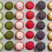Colourful choux pastries prepared with Macphie Mactop Traditional cream alternative