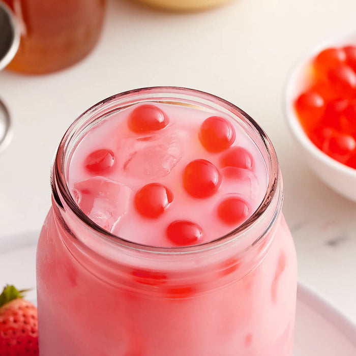 Strawberry popping boba pearls for bubble tea